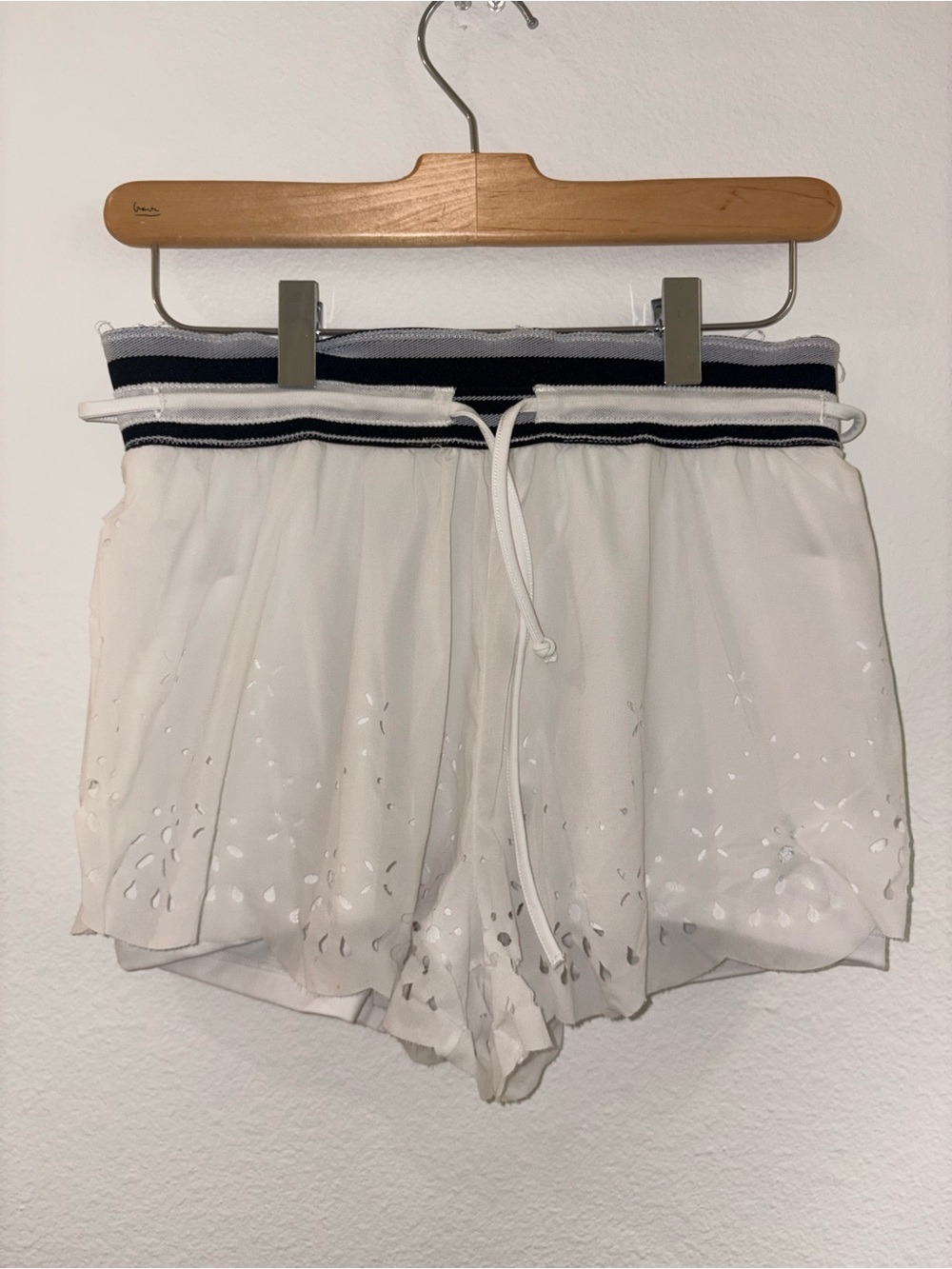 Free People White Laser-Cut Drawstring Shorts with Black Trim